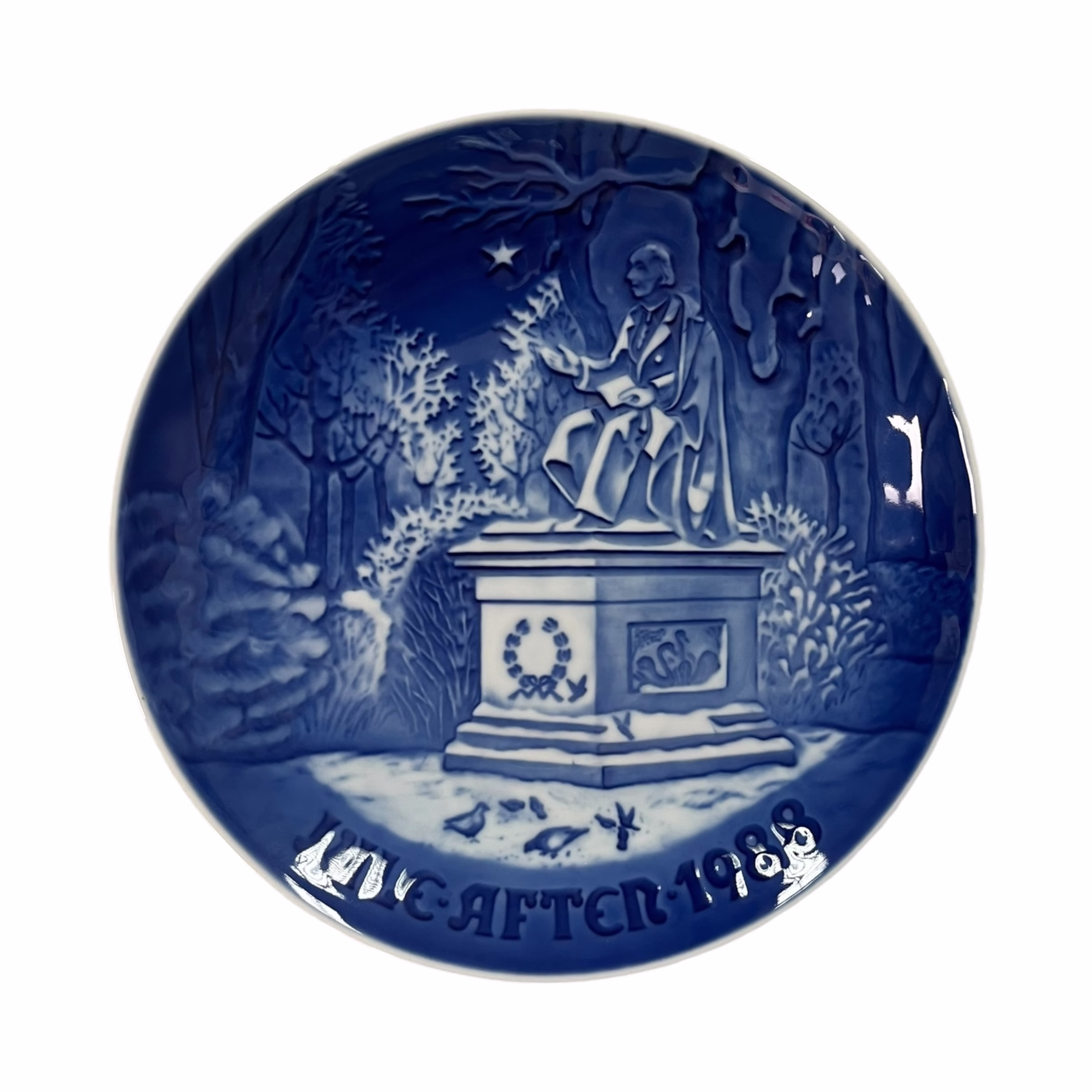 Farfurie decorativă de Crăciun din porțelan Royal Copenhagen Juleaftener 1988 Hans Christian Andersen în Grădina Regelui