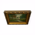 Tablou vintage pe placaj – peisaj cu pod și râu, ramă aurie sculptată Decoratiuni