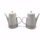 Cafetieră vintage Melitta Germania din porțelan cu husă termoizolantă din inox Portelan